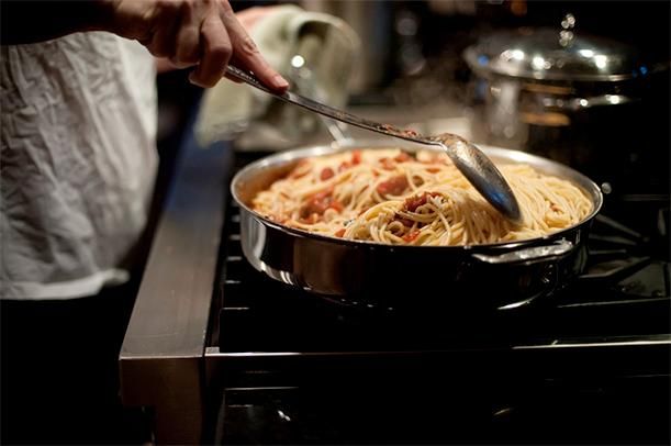 Spaghetti first began accompanying meat in Italian restaurants in America.