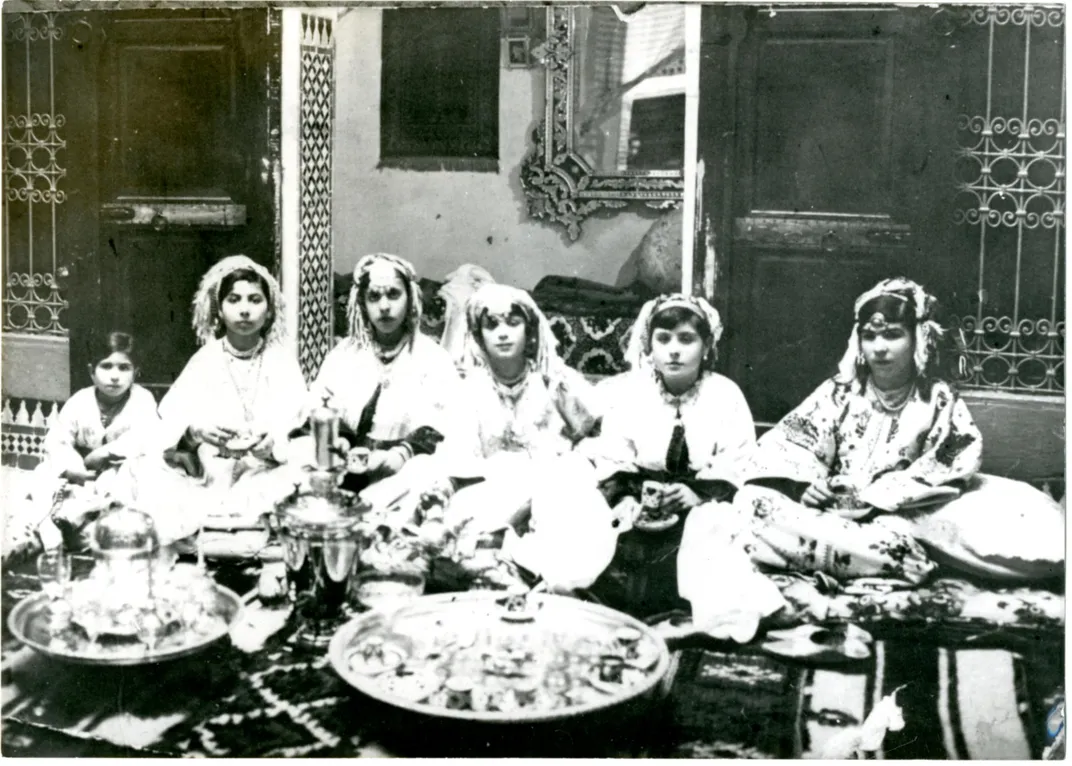 A group portrait of Moroccan Jewish women drinking tea, circa 1940 to 1950