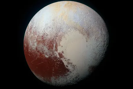 The left lobe of Pluto's distinctive heart is called Sputnik Planitia, covered with craterless plains of frozen nitrogen that vaporize each day. 