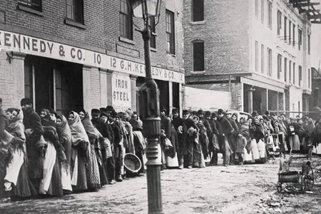 Men and women lining up during the 1902 Coal Strike for their allotment of coal. 