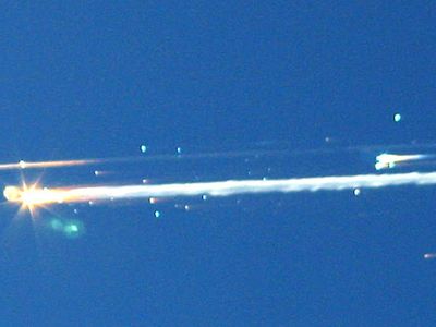 Debris from space shuttle Columbia streaks across the sky over Tyler, Texas, February 1, 2003.