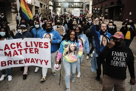 People march in Grand Rapids, Michigan, in 2021, after police in&nbsp;Louisville, Kentucky, killed Breonna Taylor, a Black woman, the year before.&nbsp;Tawanna Gordon, Taylor&#39;s cousin, leads the march.