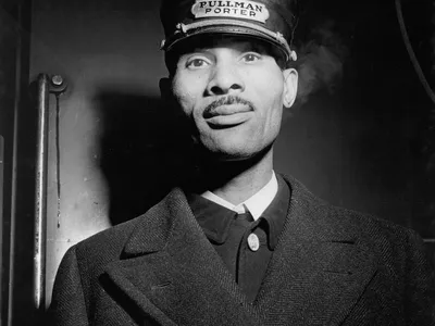 An unnamed Pullman porter works at Chicago's Union Station in 1943.