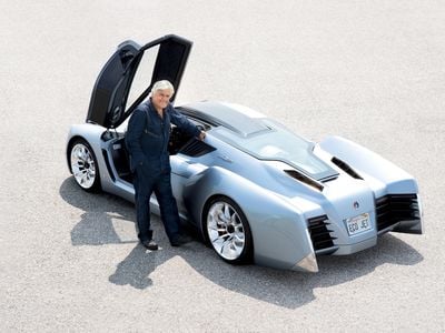 Jay Leno poses with his EcoJet