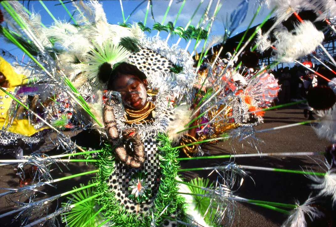 A young girl dressed in an elaborate costume while celebrating Carnival in Trinidad in 1977
