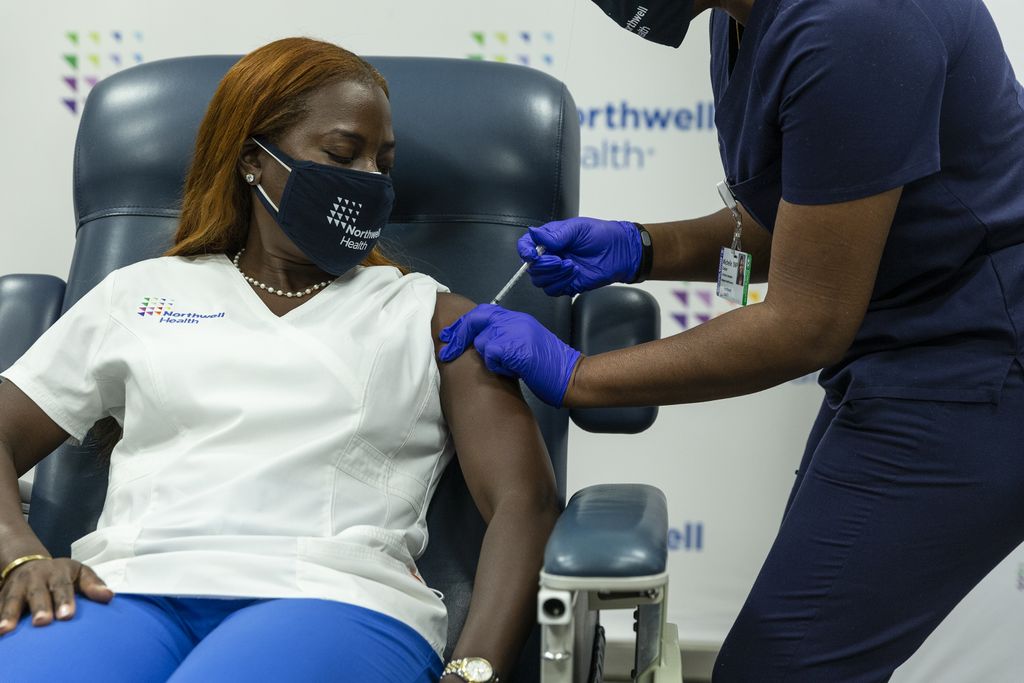 Nurse Sandra Lindsay—the first person to receive vaccine in the USA on December 14, 2020— receives COVID-19 Pfizer vaccine booster on October 6, 2021.