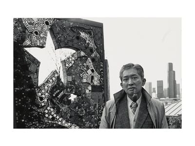 Photograph of Val Laigo next to his mosaic in Dr. Jose Rizal Park, Seattle, Washington (detail), between 1988 and 1989 / unidentified photographer. Val Laigo papers, 1954-1998. Archives of American Art, Smithsonian Institution.