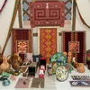 Several pieces of textiles, pottery, and other artwork arranged in an altar.
