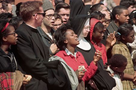 Bearing witness to the historic march and the freedom songs sung along the way, Carl Benkert carried a large tape recorder hidden from the police and angry whites.