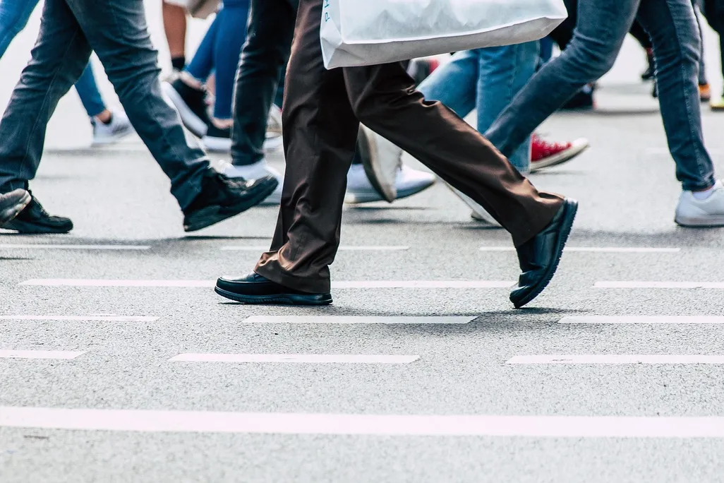 Walking legs crossing a street