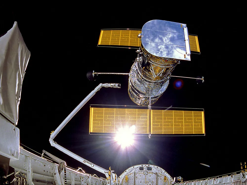 IMAX Cargo Bay Camera view of the Hubble Space Telescope at the moment of release, mission STS-31