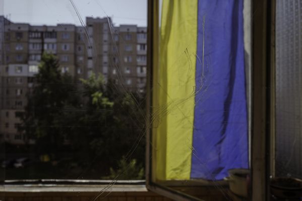 A clear tape is adhesed to a window in Kyiv to protect it from artillery shockwave thumbnail