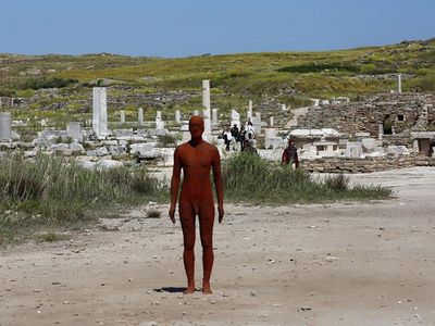 The statue "Another time V," part of British sculptor Antony Gormley's exhibiton "Sight," is displayed on the Greek island of Delos, a UNESCO World Heritage protected ancient archaeological site.