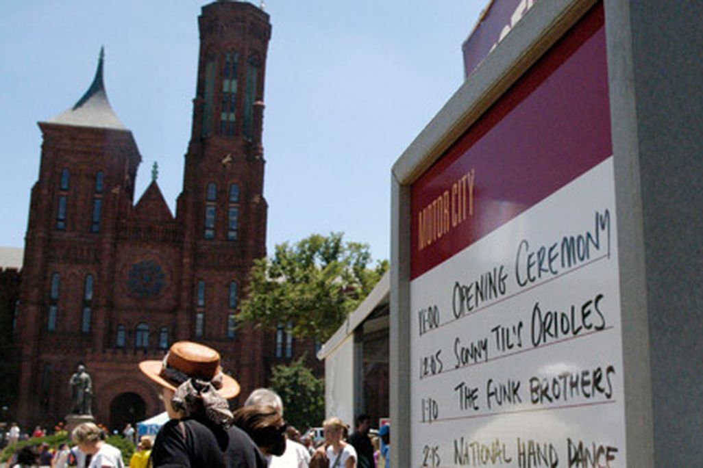 Smithsonian Castle serves as a backdrop to the the Motor City stage at the 2011 Smithsonian Folklife Festival.