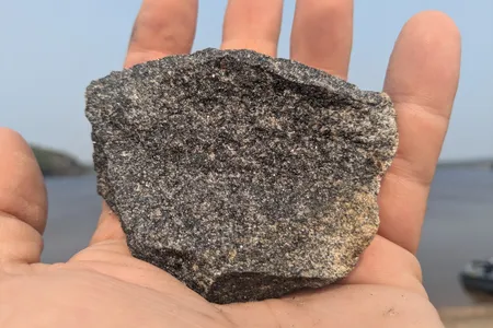 Geologist Michael Ackerson holds a sample from Canada&#39;s Acasta Gneiss formation, home to some of the oldest rocks on the planet.