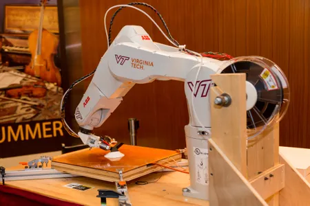 Virginia Tech, whose Institute for Creativity, Arts, and Technology (ICAT) was instrumental in bringing the festival to fruition, exhibited on Day 1 a cutting-edge robotic fabrication system.