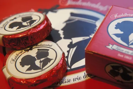 The &ldquo;Studentenkuss,&rdquo; or Student Kiss, is a praline nougat on a waffle wafer covered in dark chocolate, about the size of a Reese&rsquo;s Peanut Butter Cup.