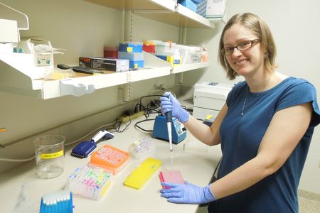 Katrina Lohan analyzes parasite DNA in SERC’s Ecological Genomics Core. The results help detect parasites infecting oysters or lurking the ballast water of large ships. (Credit: Kristen Minogue/SERC)