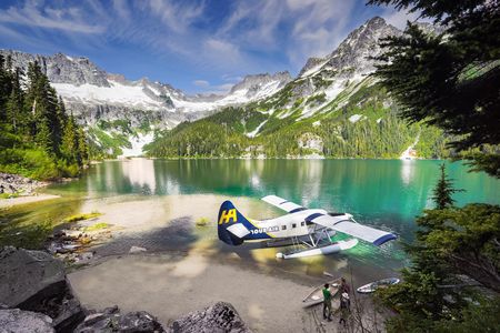  A Harbour Air DHC-3 Otter on the beach of a remote alpine lake in Canada.