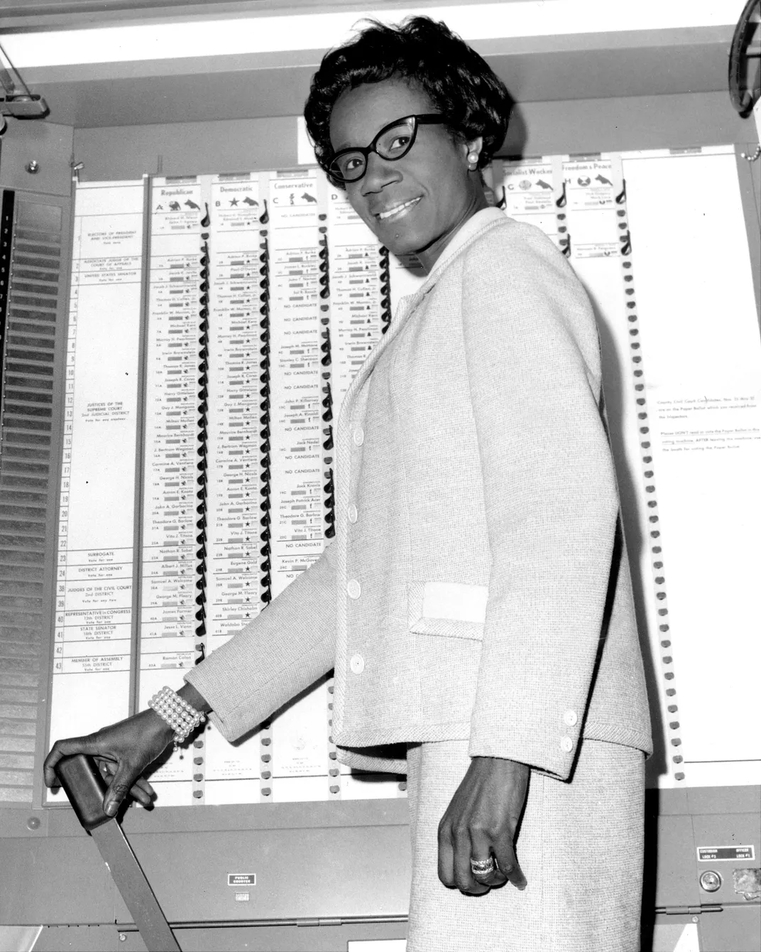 Chisholm in a voting booth
