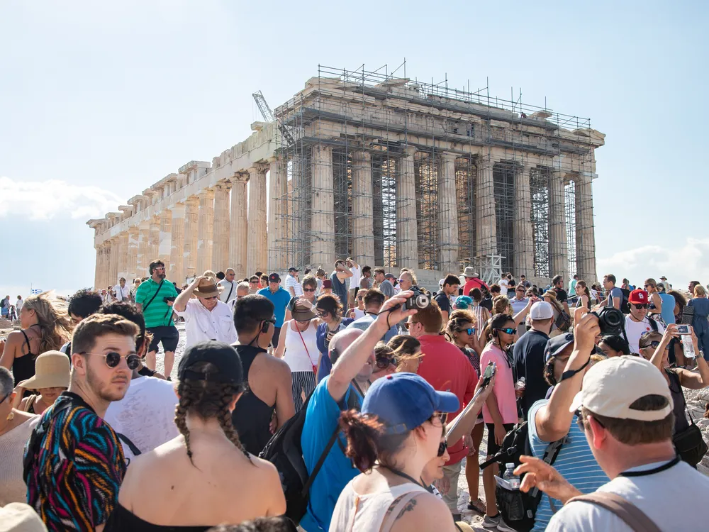 Crowds of tourists at the Acropolis in Greece