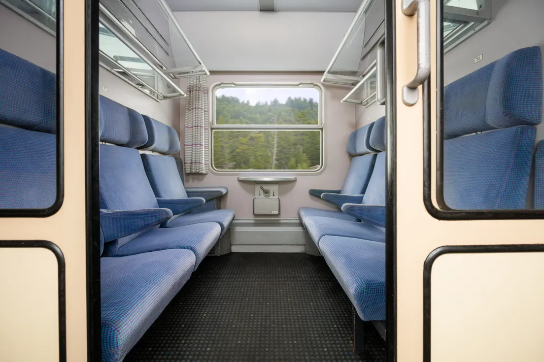 Blue seats on rail car