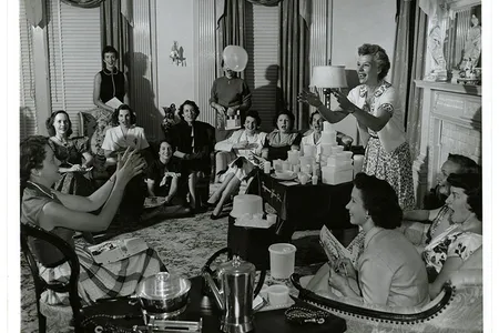 To demonstrate Tupperware's patented seal, Brownie Wise tosses a bowl filled with water at a party.