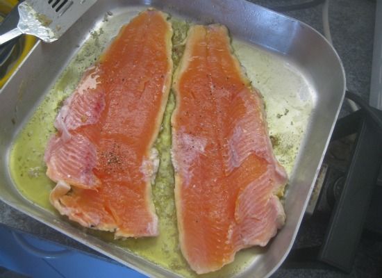 A reward of trout fishing: seasoned fillets simmering in olive oil.
