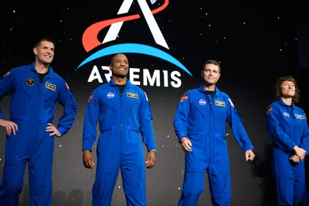 From left to right: astronauts&nbsp;Jeremy Hansen, Victor Glover, Reid Wiseman and Christina Hammock Koch during a news conference following Monday's announcement.