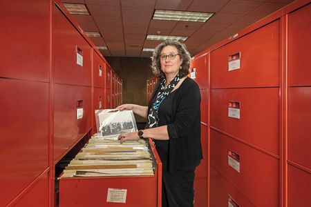 Archivist Patti Williams pulls an item from the more than 1,920 cubic feet of material in the National Air and Space Museum’s Technical Reference Files.