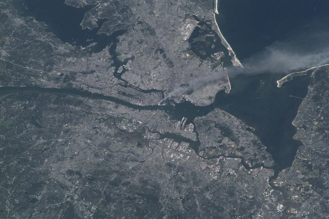 Plume of smoke seen rising above Manhattan on 9/11, as photographed by a crew member at the International Space Station