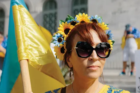 Adorned in the blue and yellow of the Ukrainian flag, Victoria Franco takes part in a protest near Los Angeles City Hall on March 19, weeks after Russia invaded Ukraine.