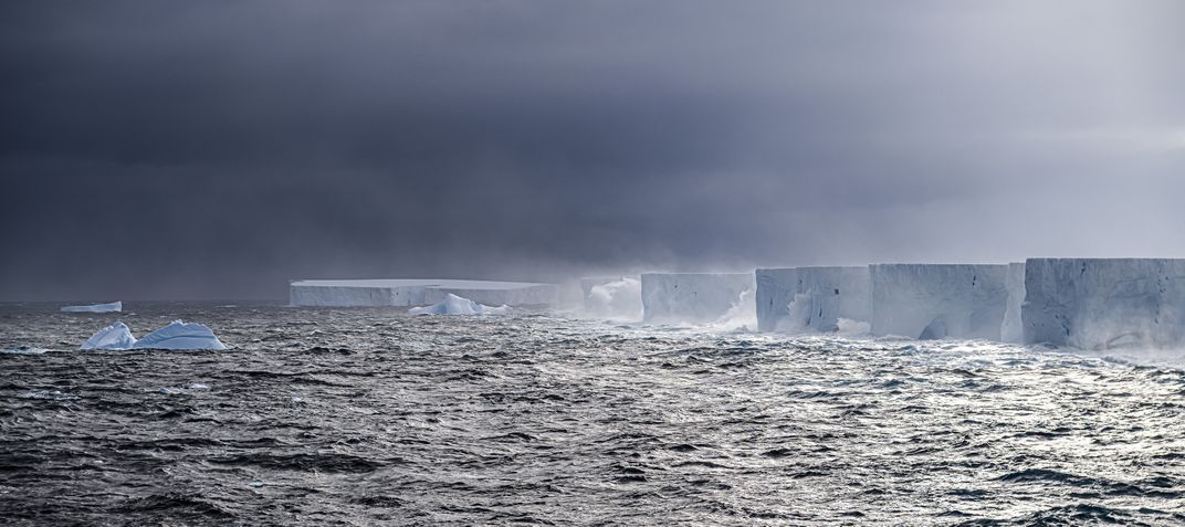 View of large iceberg on top of water