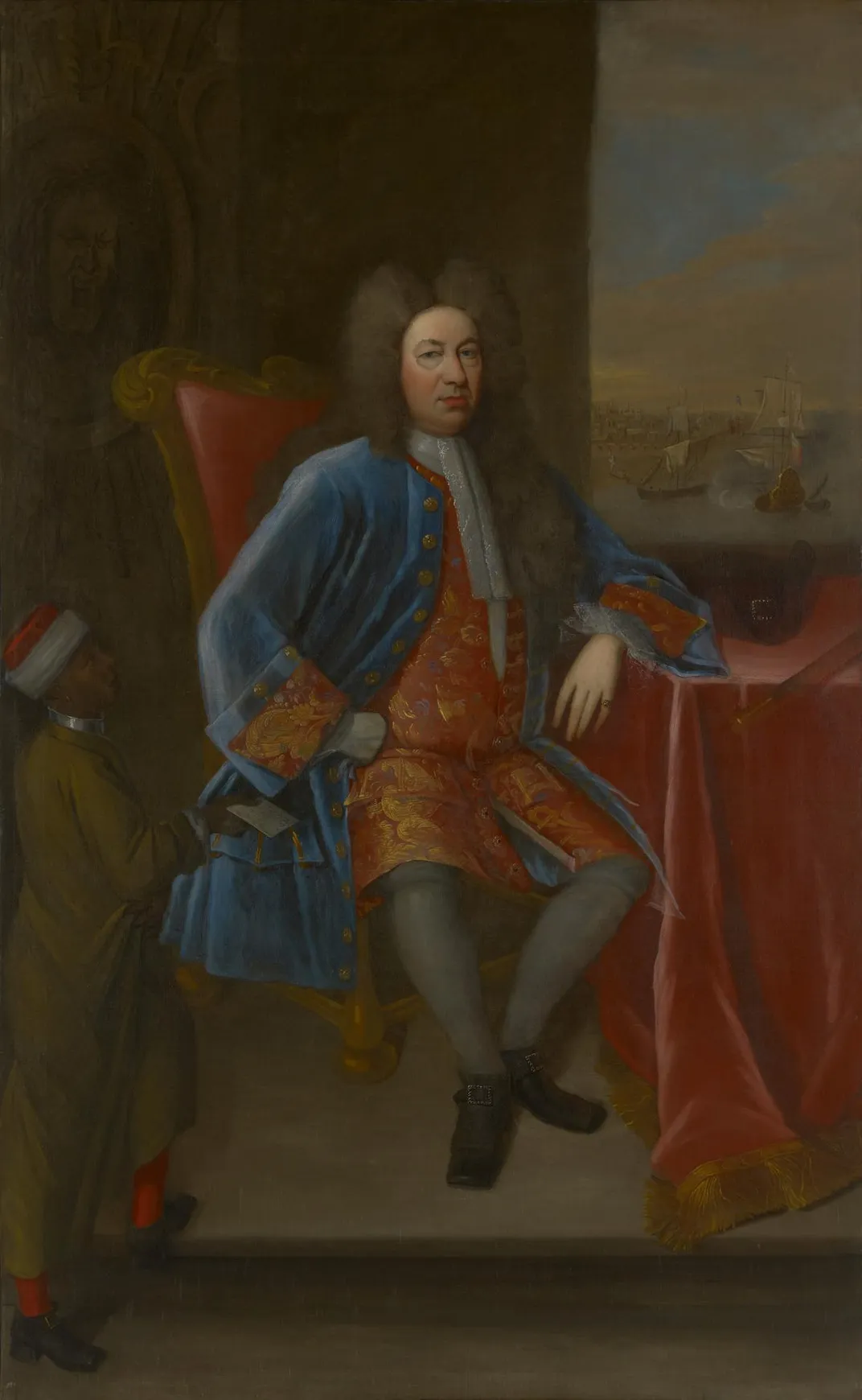 A portrait of Elihu Yale, a white man in a wig and red and blue finery, seated at a table covered in red velvet. A man with dark brown skin walks up to him from the left of the canvas and offers him a letter