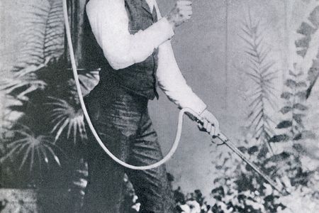 David Fairchild demonstrates a new crop spraying technique in 1889.