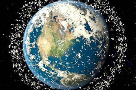 Hundreds of thousands of man-made fragments of debris orbit around the Earth, as depicted here in an illustration of the cosmic mess.