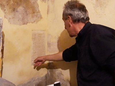 Artist Jean Charles Blais and his contractor discovered the engraving behind a layer of plaster on his studio wall.