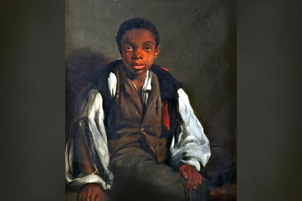 Portrait of black child looking at viewer