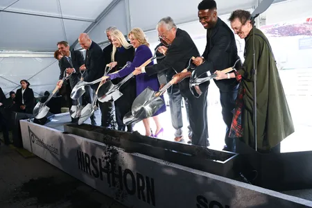 First lady Jill Biden and Hirshhorn Museum Director Melissa Chiu, flanked by artists and dignataries, hosted a groundbreaking ceremony to begin the renovation of the Sculpture Garden.