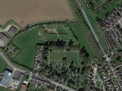 A satellite view of a region of Buckingham, England where 42 skeletons were recently unearthed on a former farm situated near a cemetery (center)