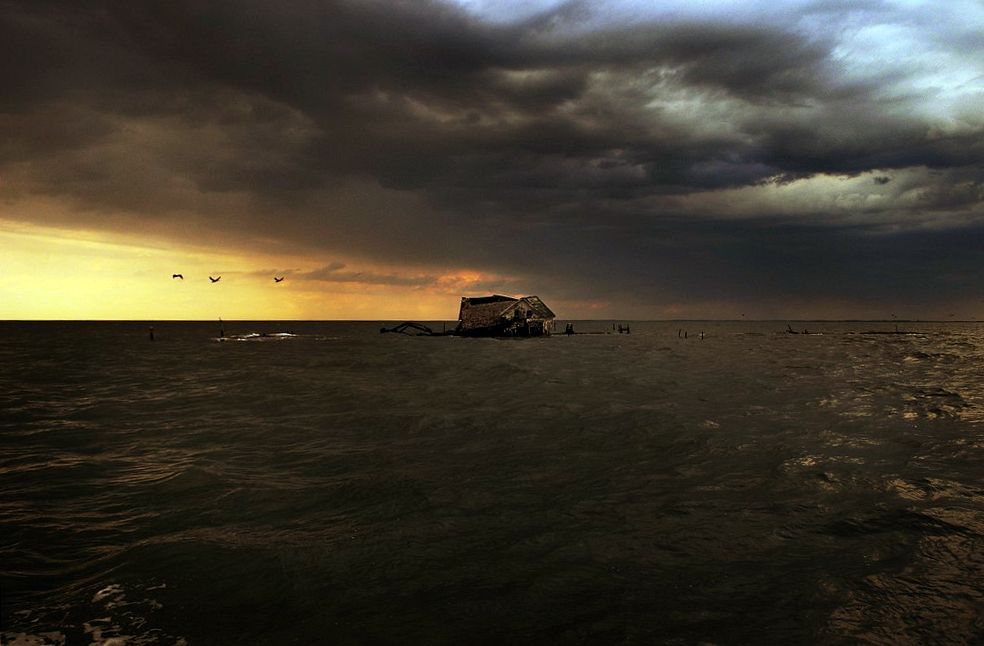 Holland Island, a large Chesapeake Bay island that was reduced to one house by erosion, has