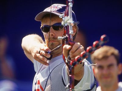 Butch Johnson draws his bow during the Olympic Men's Archery competition in 2000 in Sydney, Australia.
