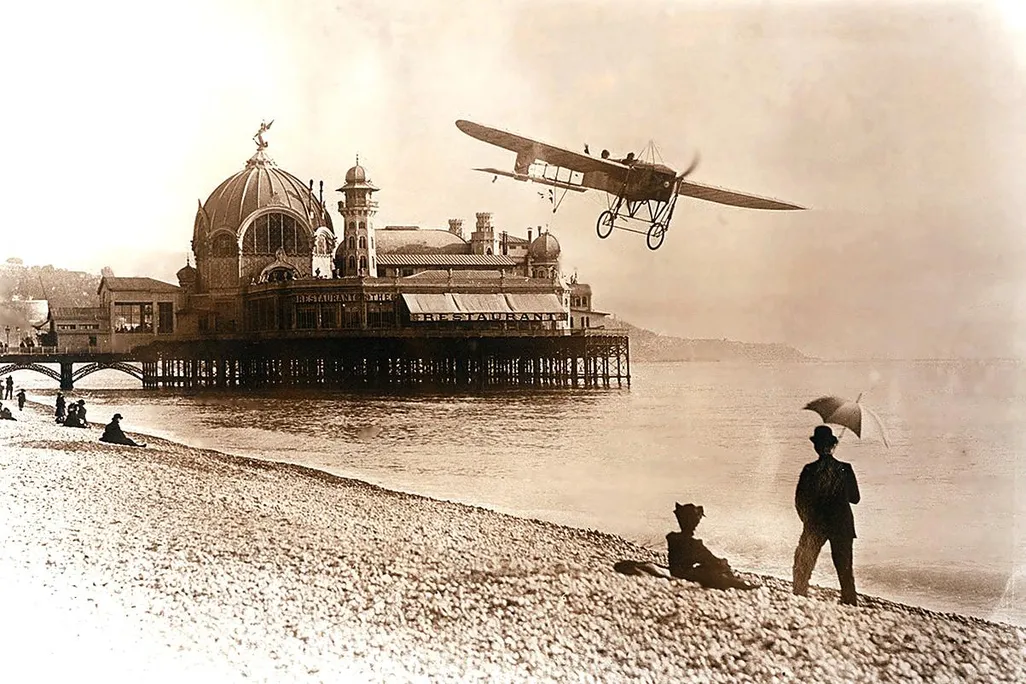 Bleriot XI-2 over a beach