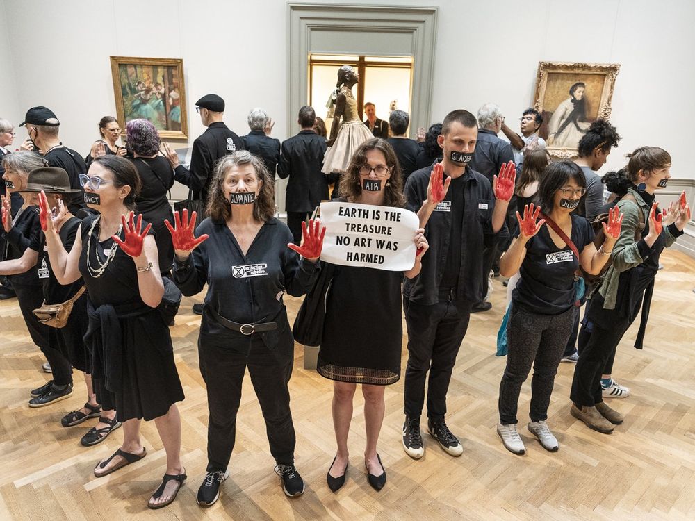 Protesters stand in a circle