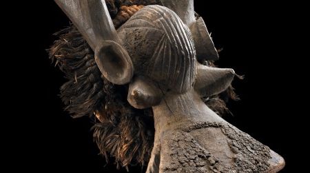 A Yukuben horizontal cap mask blends human and animal features.