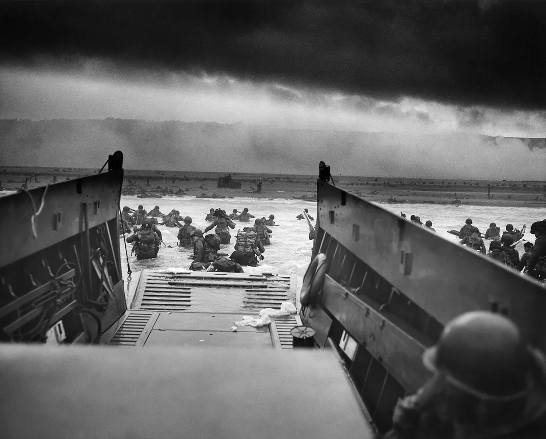 American troops disembark at Omaha Beach on June 6, 1944.