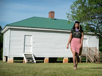To mark her graduation from dental school in 2021, Breanna Henley took photographs in front of a slave cabin at Redcliffe Plantation.