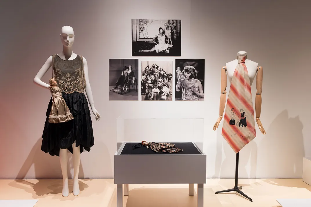 A section on flappers and boudoir dolls in "Doll Dressing," featuring a 1920s dress and doll (left)