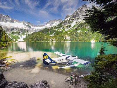  A Harbour Air DHC-3 Otter on the beach of a remote alpine lake in Canada.