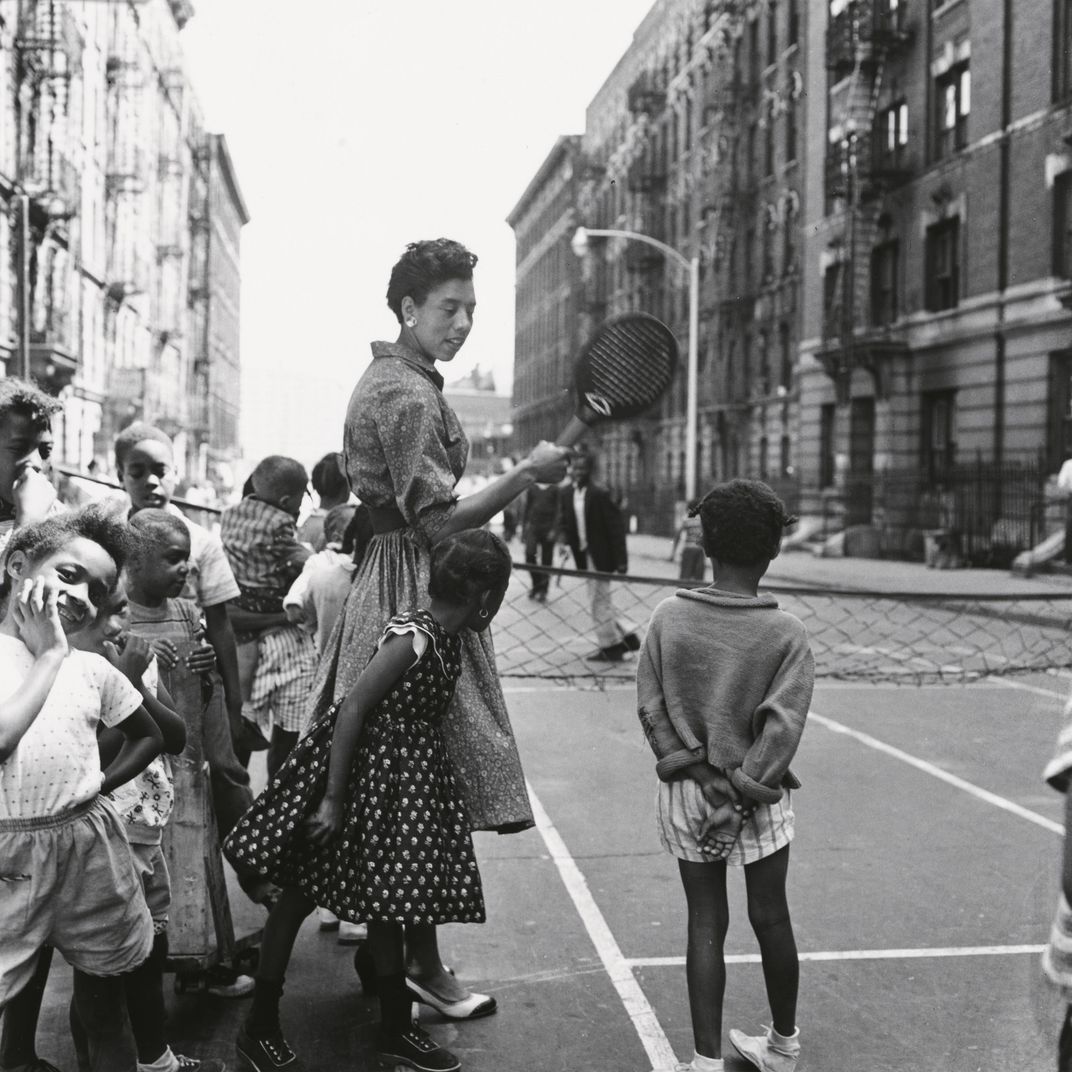 Althea Gibson teaches children 